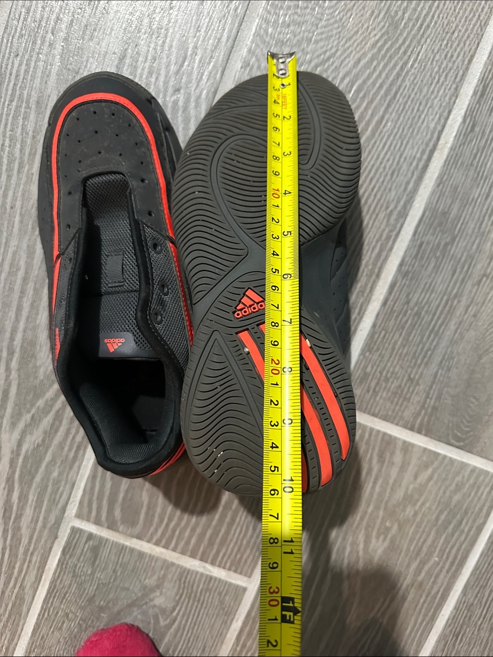 adidas Kids Black Sneakers with Red Stripe Accent
